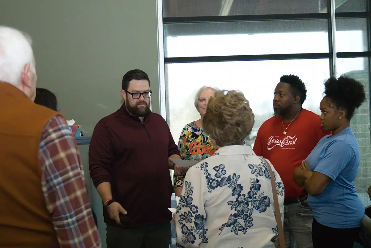 Members talking together after a service at North Pointe