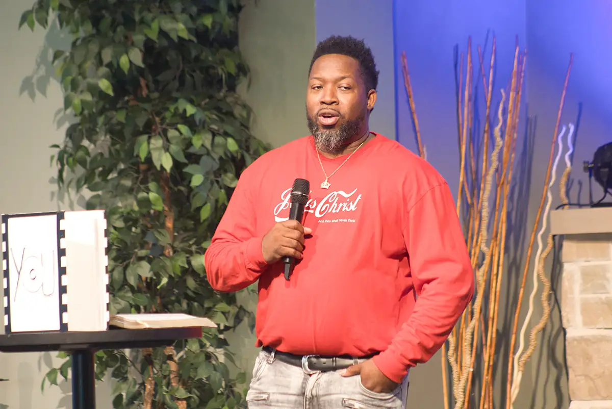 A speaker sharing during worship